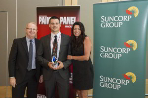 Brenda and Chris Gosney accept Best Customer Experience Award from Suncorp's Simon Grant